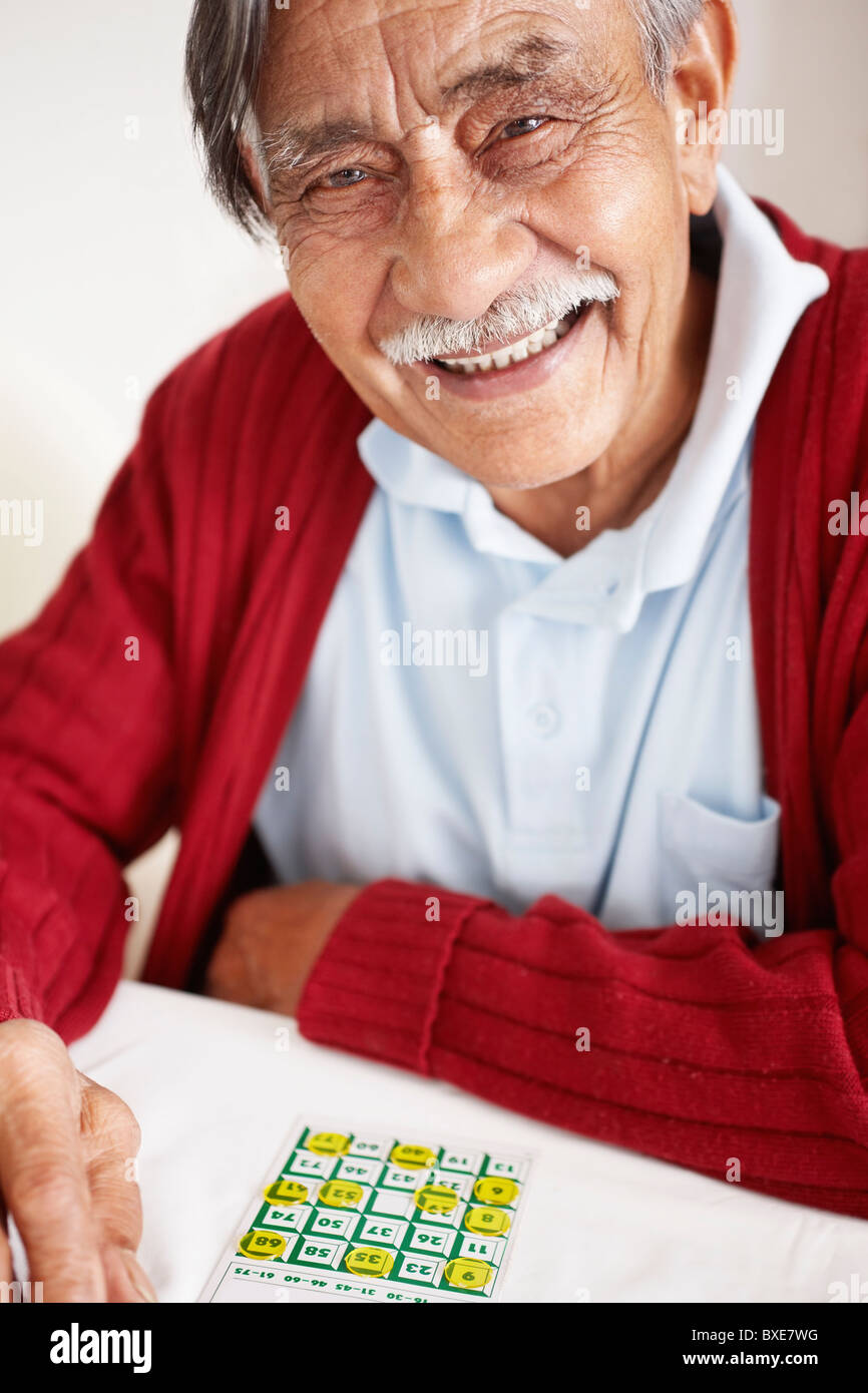 Senior man playing bingo Stock Photo - Alamy