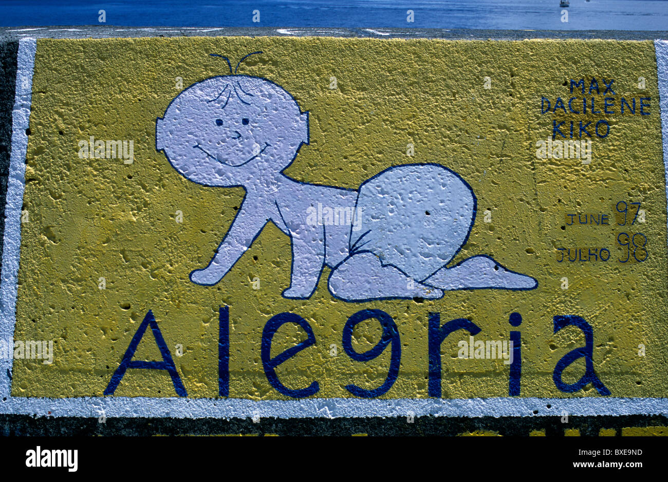 Hand-painted ship's calling cards on the quayside in Horta marina, Faial island, in the Azores Stock Photo