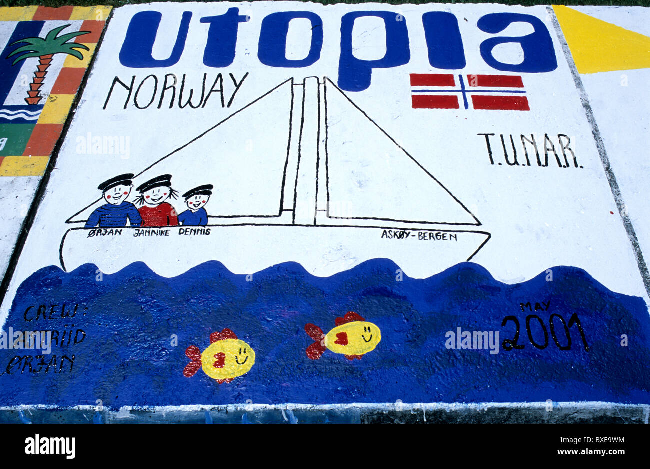 Hand-painted ship's calling cards on the quayside in Horta marina, Faial island, in the Azores Stock Photo