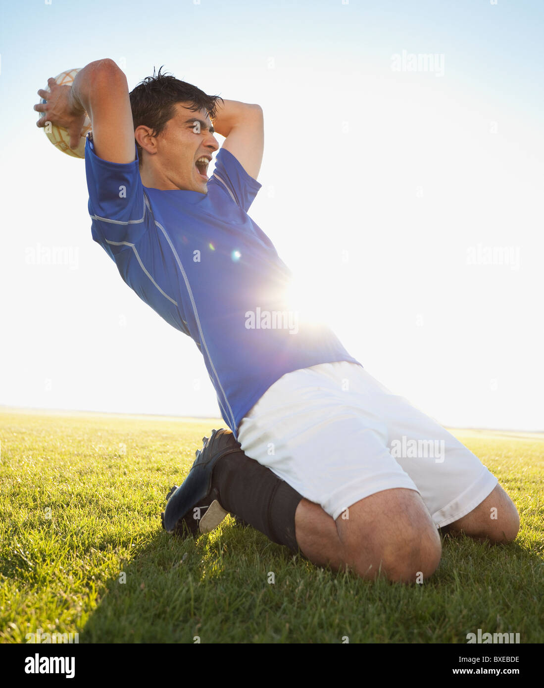 Soccer player throwing ball hires stock photography and images Alamy