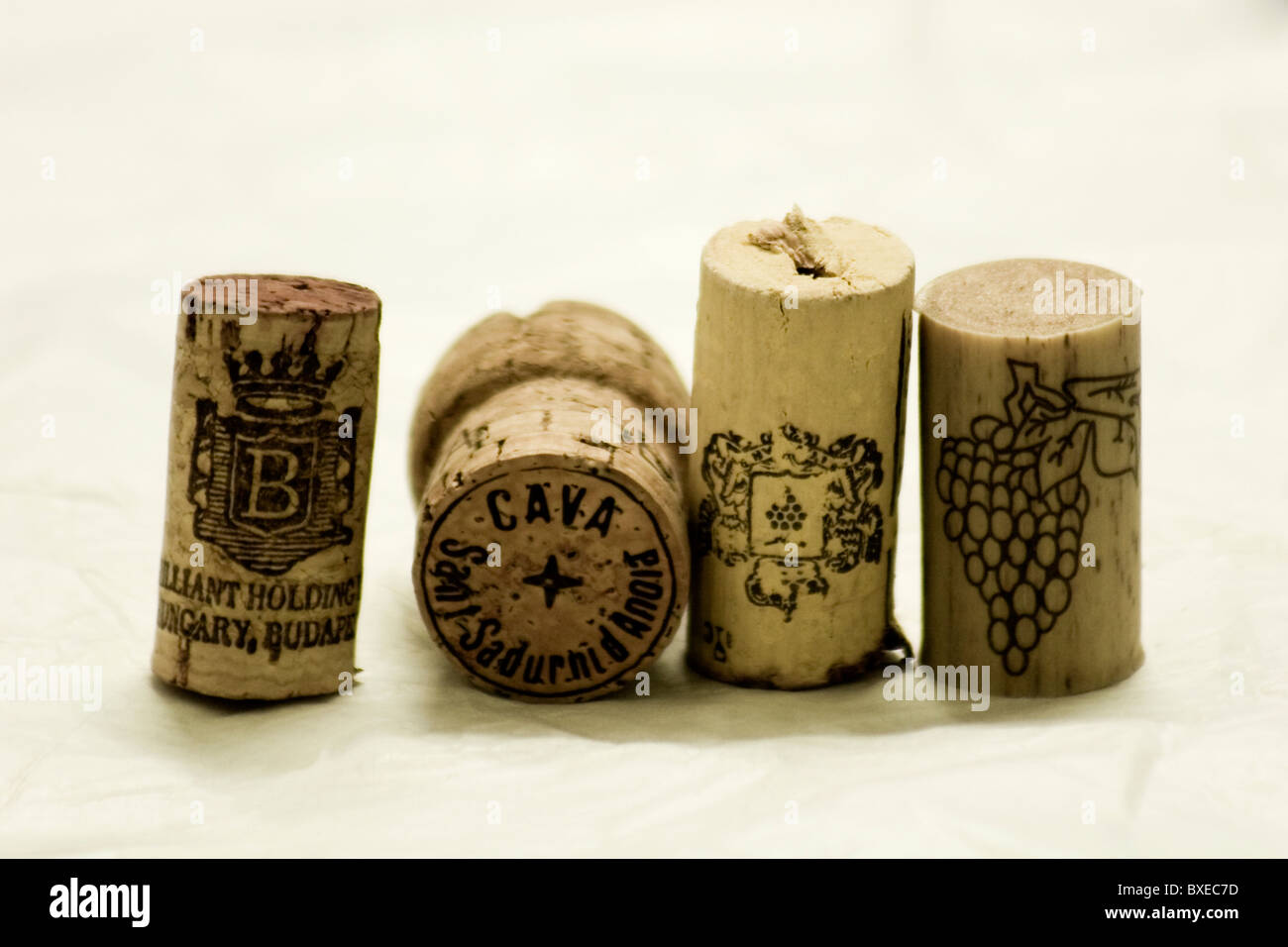 4 corks against white background Stock Photo
