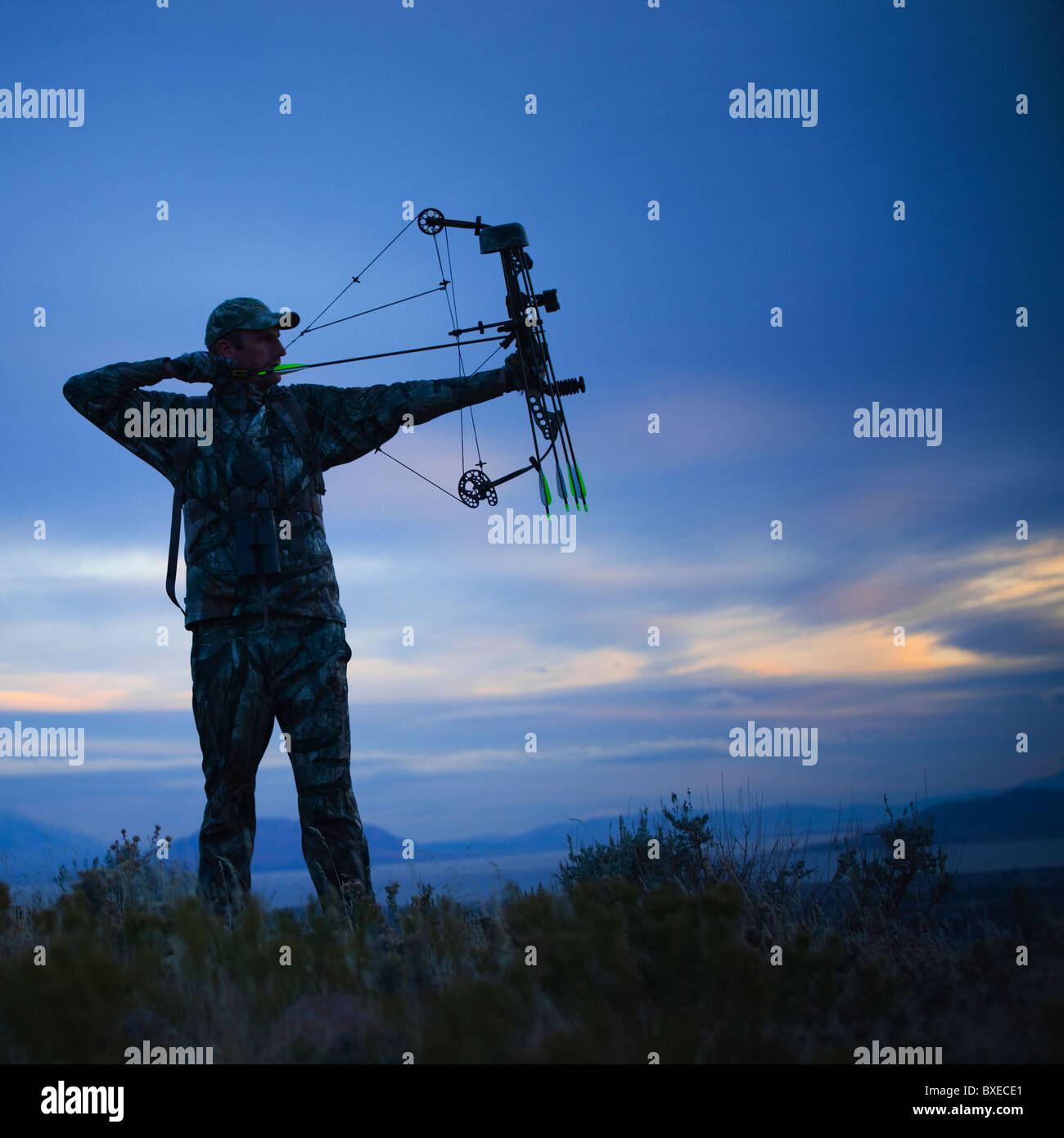 Hunter With Bow And Arrow High Resolution Stock Photography and Images