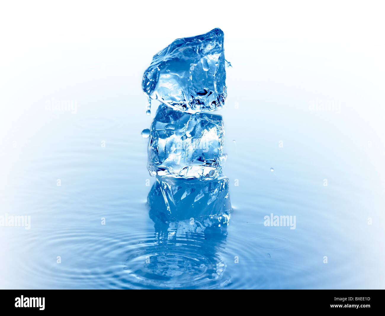 Stack of ice cubes in water Stock Photo
