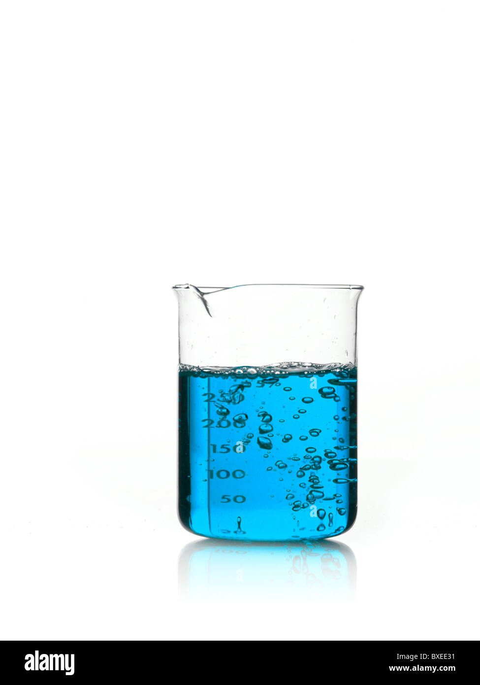 Blue liquid in measuring cup Stock Photo