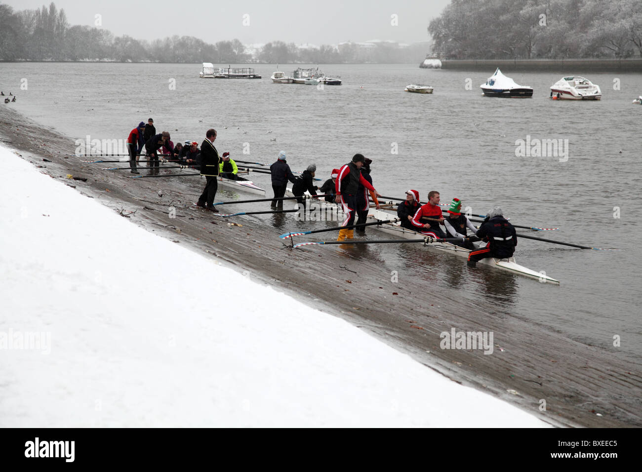 Rowers finishing off their training in snow. London Stock Photo