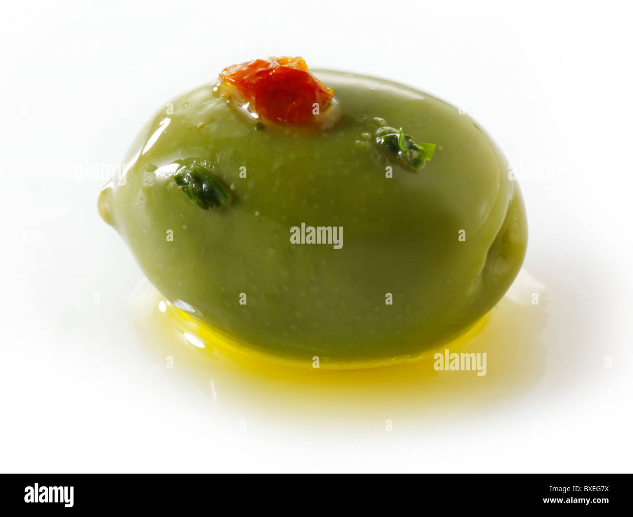 Whole green Queen olives Stock Photo Alamy