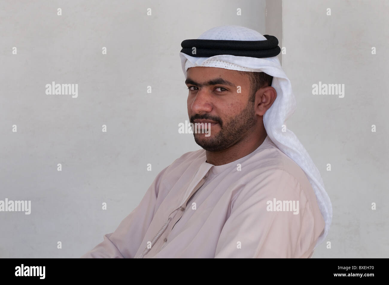 A Man with the typical Arabic dress in Dubai Stock Photo