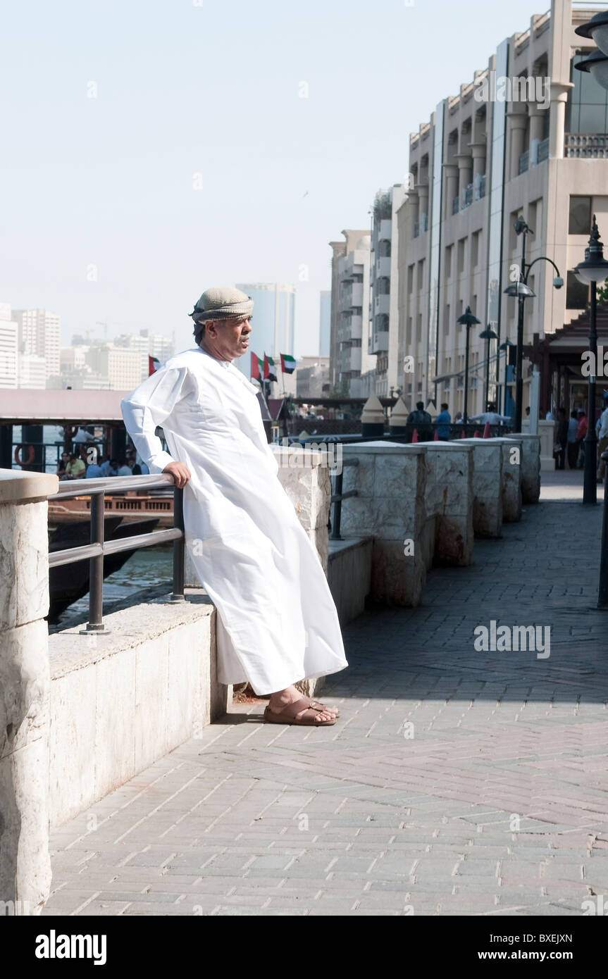 a man in a traditional white dress in Dubai Stock Photo