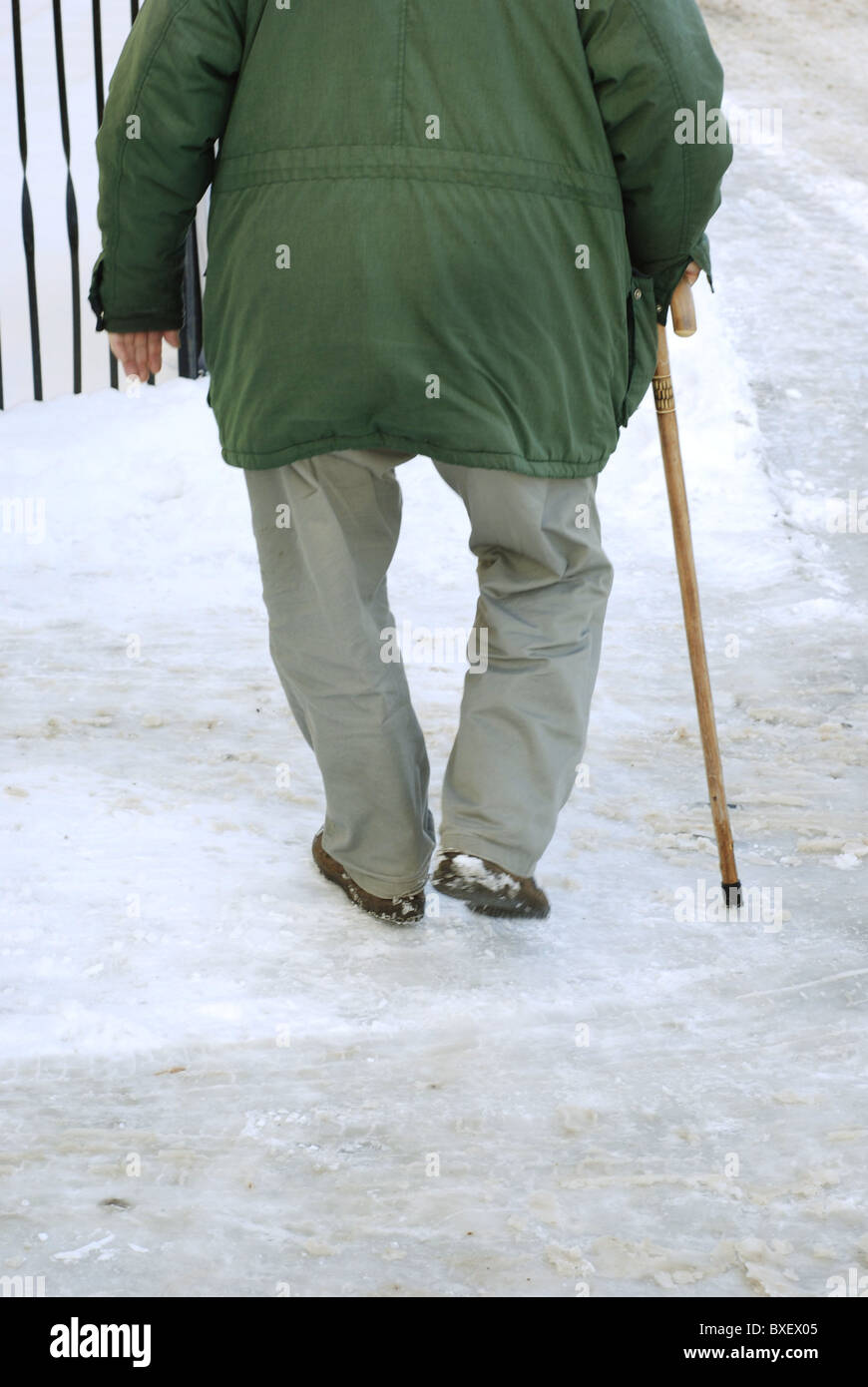 Old man with walking stick hi-res stock photography and images - Alamy