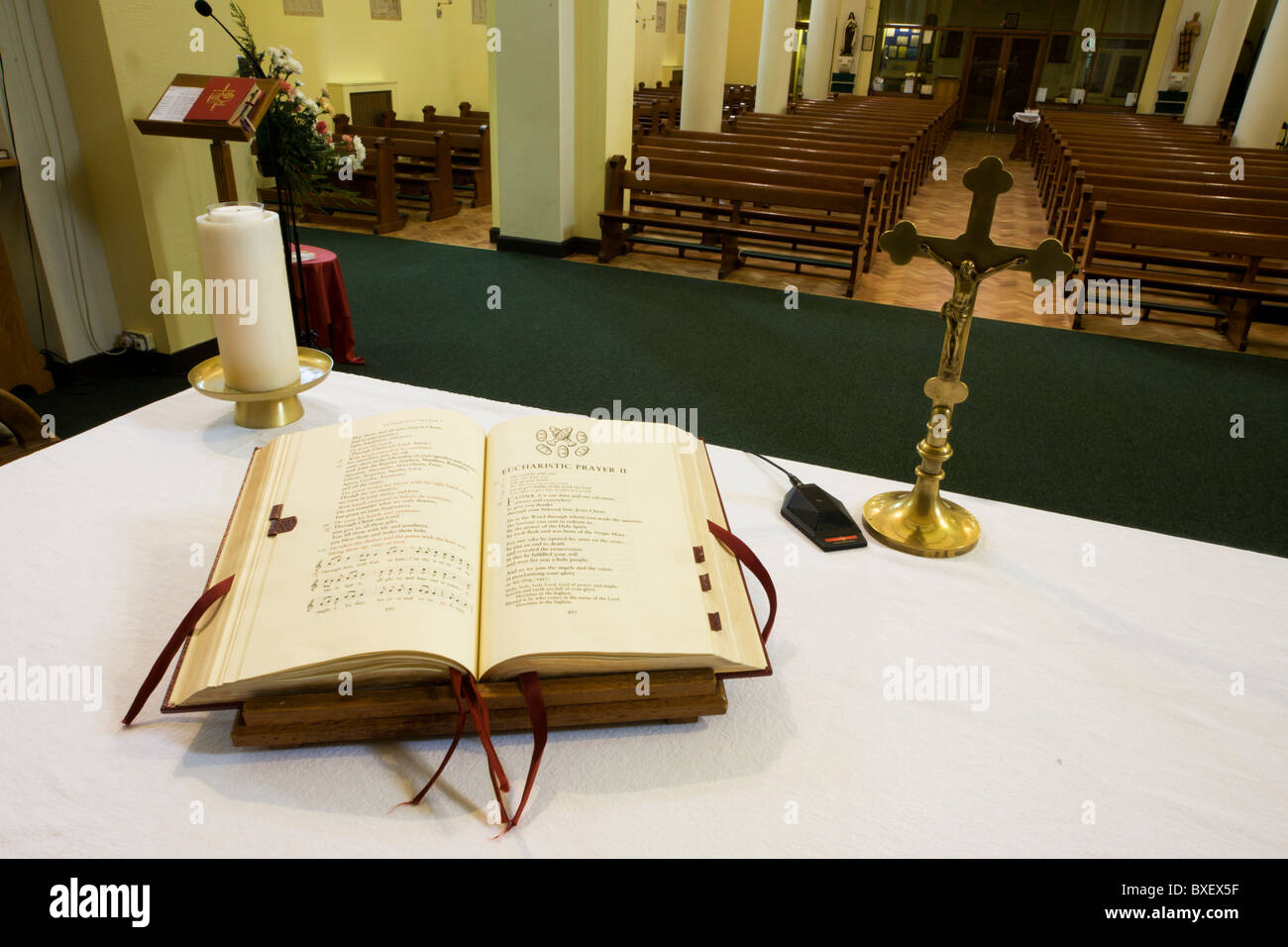Open Bible and crucifix on altar in St. Lawrence's Catholic church in