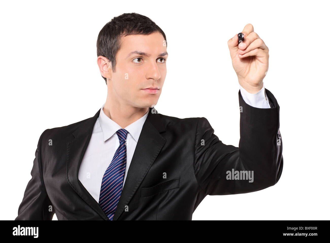 A view of a young businessman holding a pen Stock Photo - Alamy