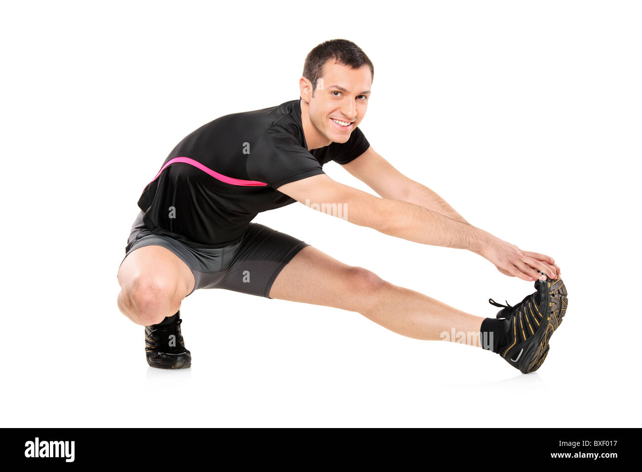 Full length portrait of a young athlete exercising Stock Photo Alamy