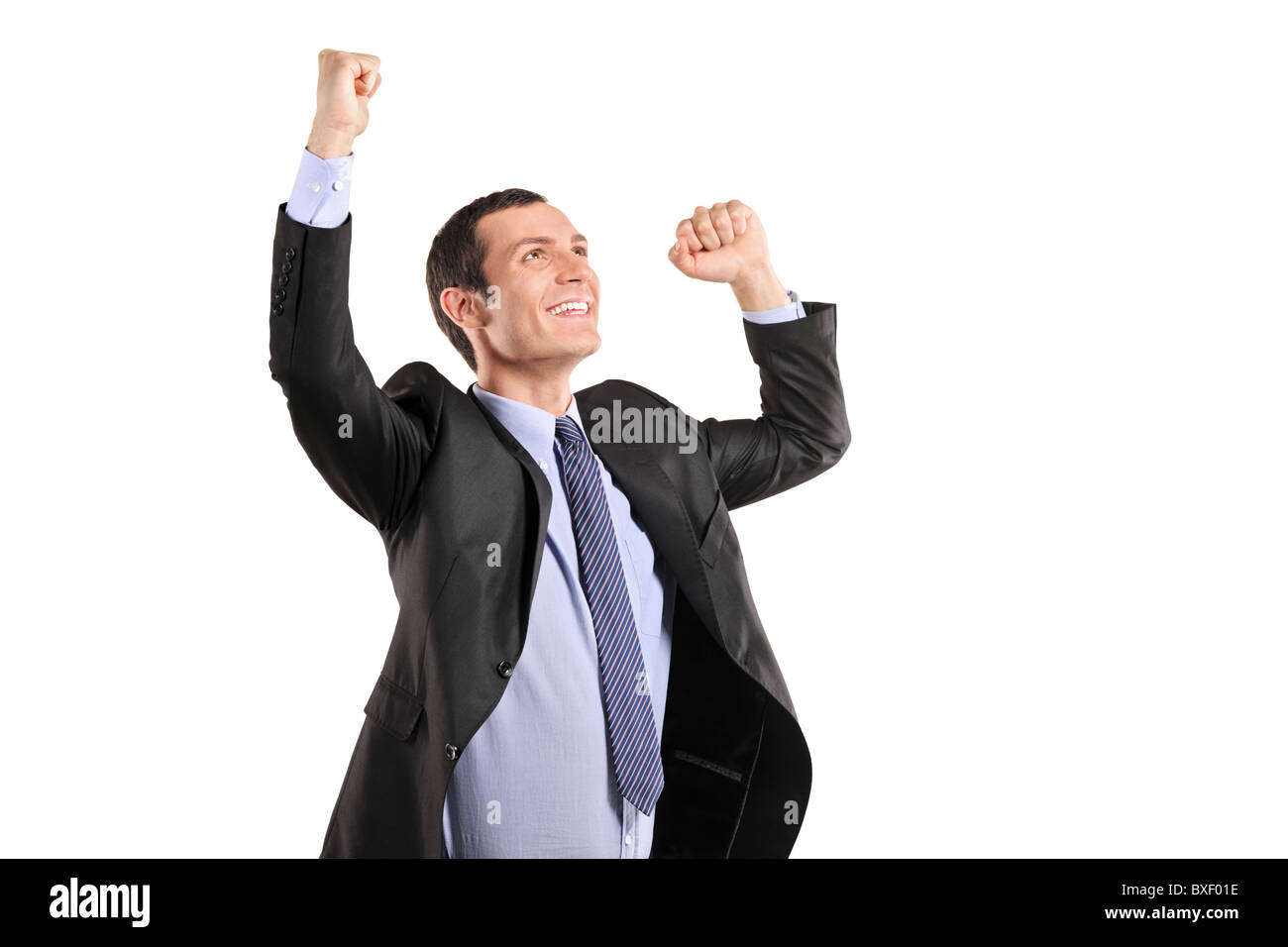 Portrait of a young happy businessman with raised hands Stock Photo - Alamy