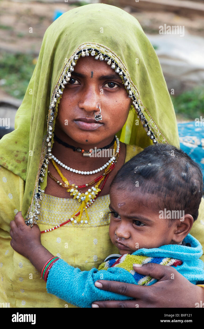 Gadia Lohar. Nomadic Rajasthan woman and baby boy. India's wandering blacksmiths. India Stock Photo