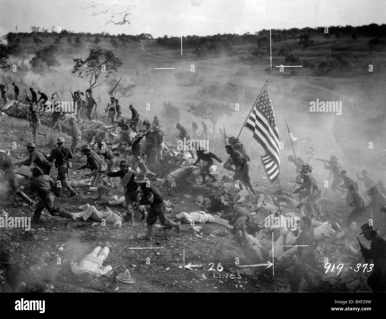 Colonel Theodore Roosevelt's famous regiment Rough Riders chargins San Juan Hill during the Spanish American War in 1898. Cavalry Stock Photo