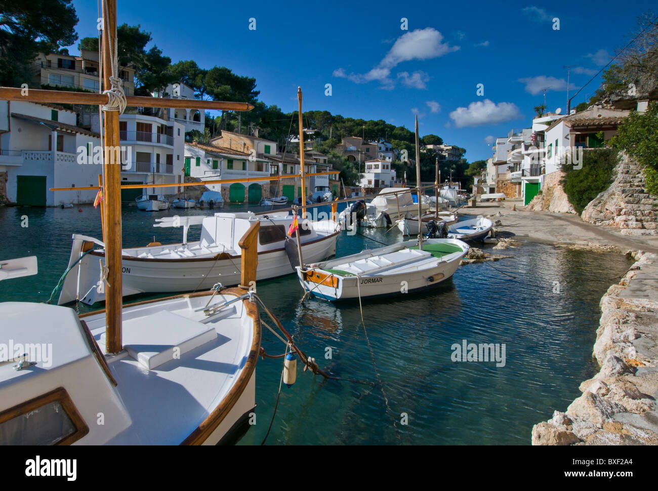 Cala Figuera Mallorca harbour with fishing boats houses and villas, Mallorca Balearic Islands Spain Stock Photo