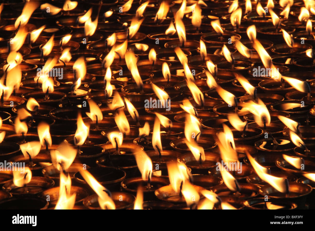 Burning yak butter candles on the pilgrim path or Lingkhor around Iron