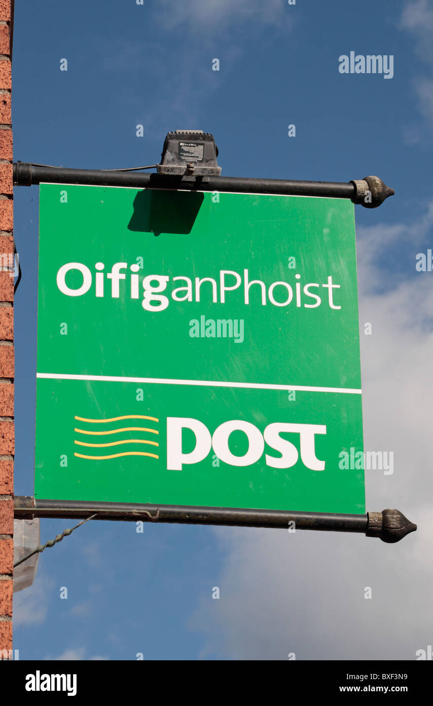 The Irish Post Office (Oifig an Phoist) logo on a sign outside the branch in Cahir, Co Tipperary, Ireland (Eire) Stock Photo