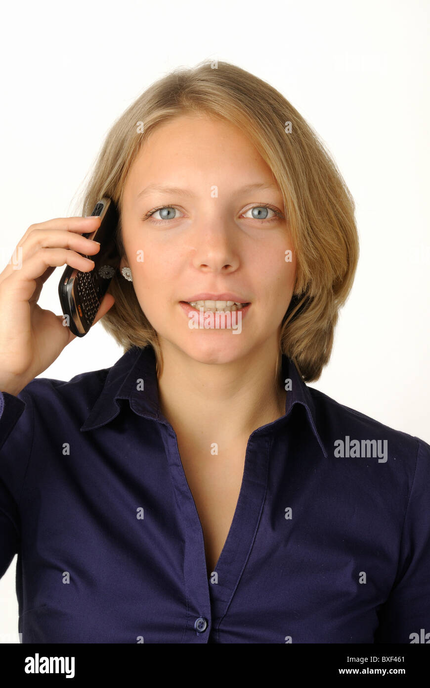 Young woman making a call on a mobile phone Stock Photo