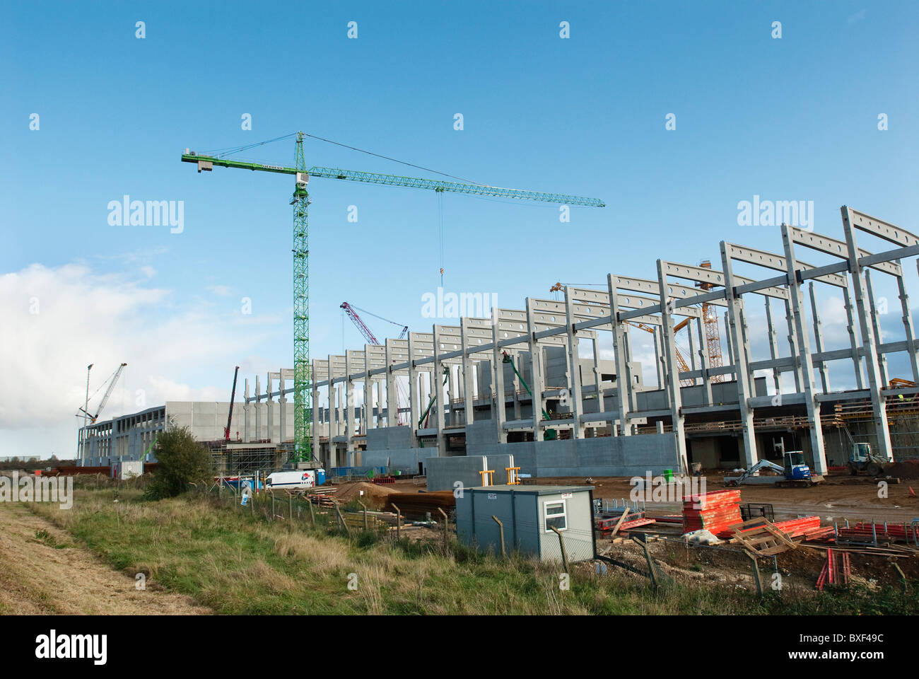 Construction crane lifting precast concrete hires stock photography