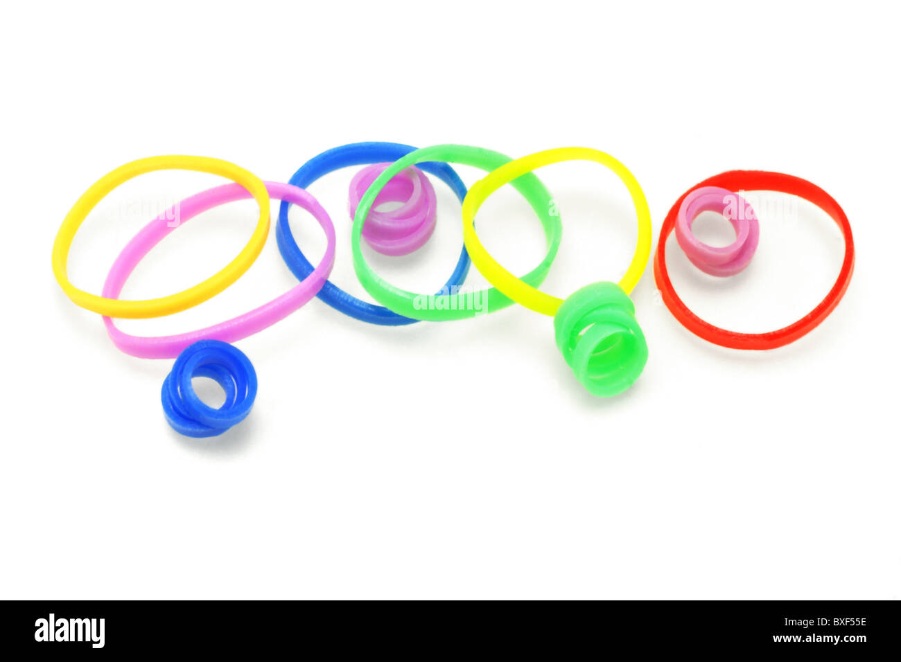 Colorful rubber bands arranged on white background Stock Photo - Alamy