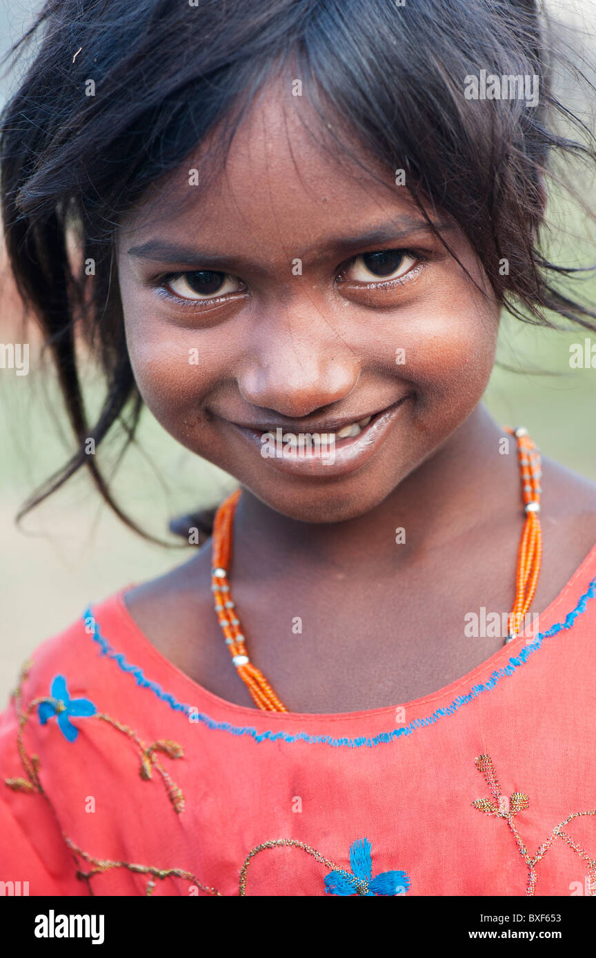 Happy young poor lower caste Indian street girl smiling. Andhra Pradesh ...