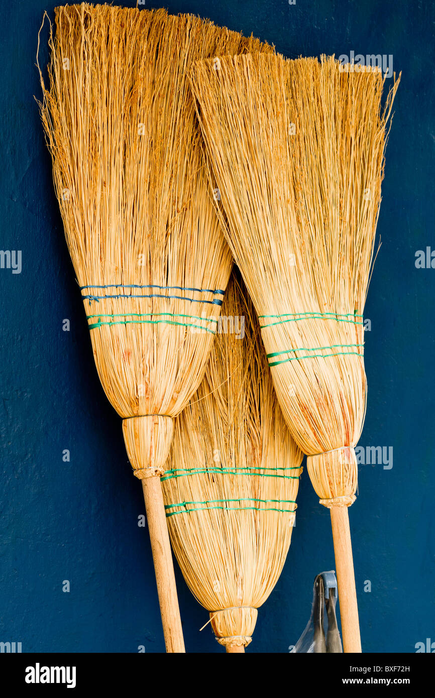 Turkey Fethiye Brooms Leaning Against A wall Stock Photo