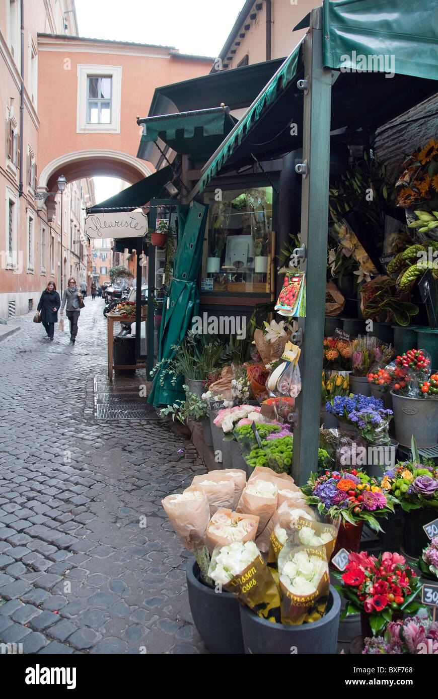 Street flower seller in Via dei Greci, Rome, Italy Stock Photo
