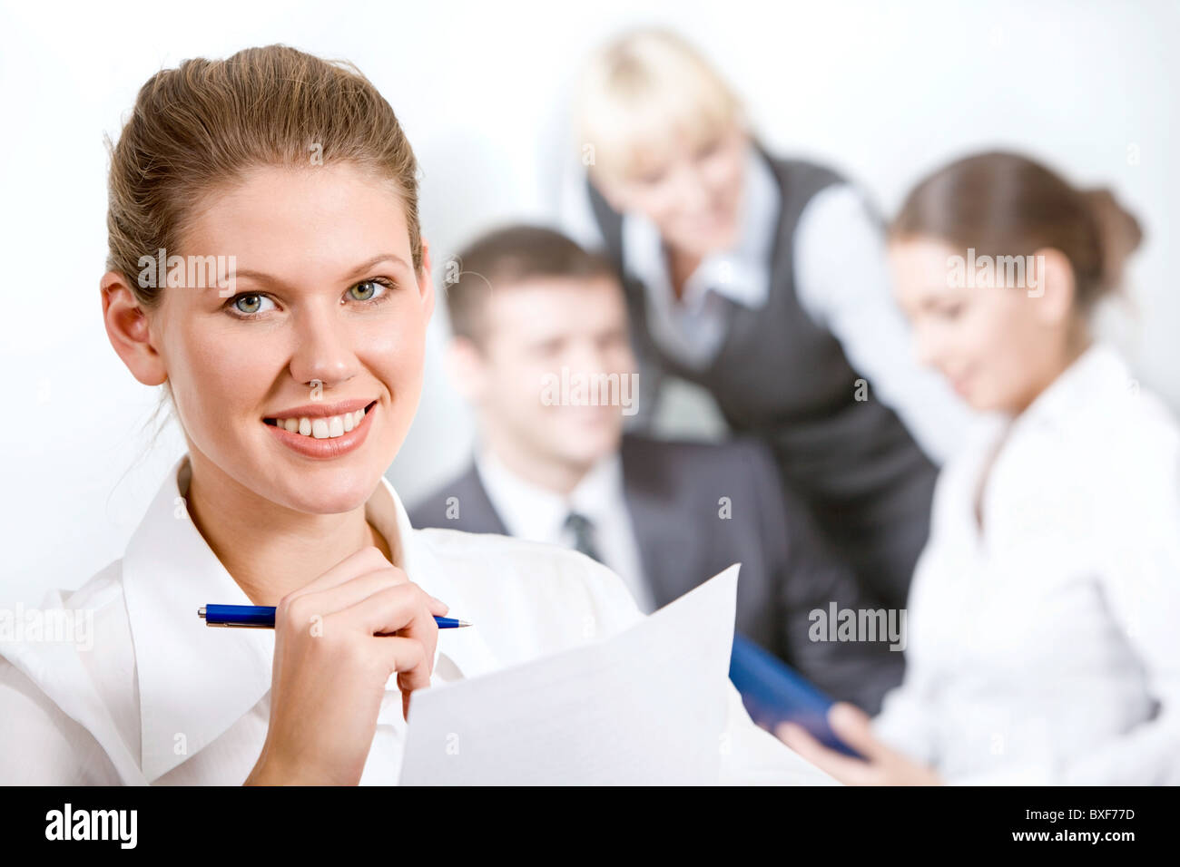 Portrait of wonderful employee in a working environment Stock Photo - Alamy