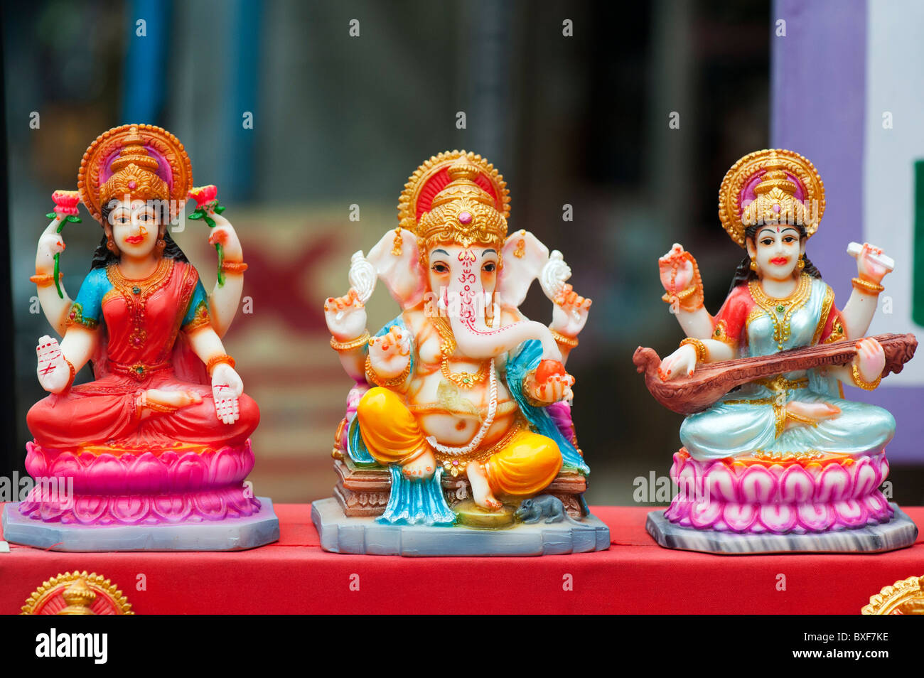 Colourful Indian religious hindu statues on a market stall. Puttaparthi