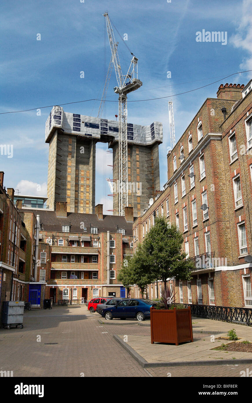 Concrete support towers of student accommodation development under construction Spitalfields Central London UK Stock Photo