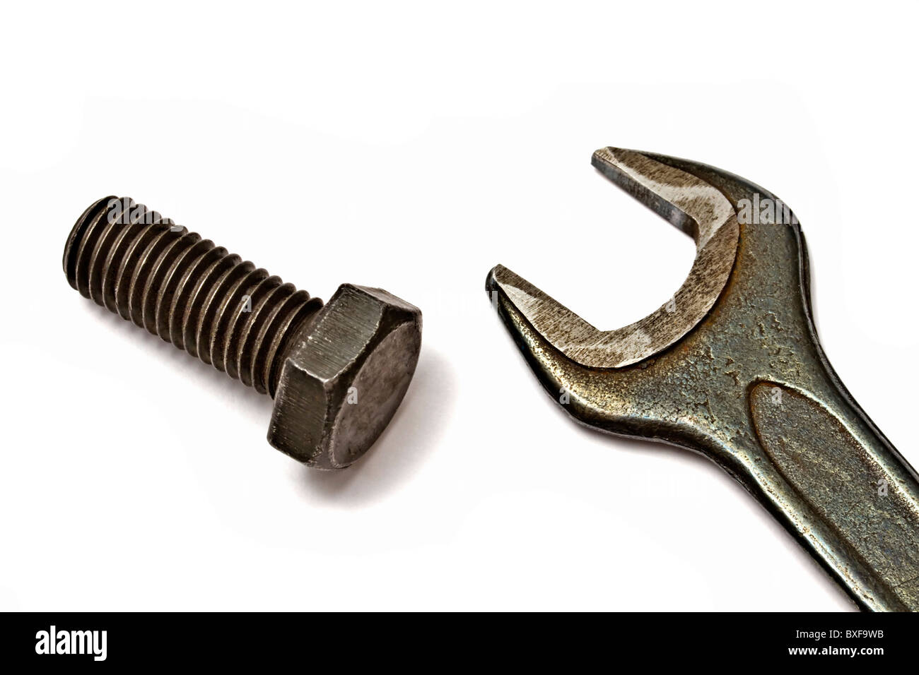 Old wrench and bolt isolated on white background Stock Photo - Alamy
