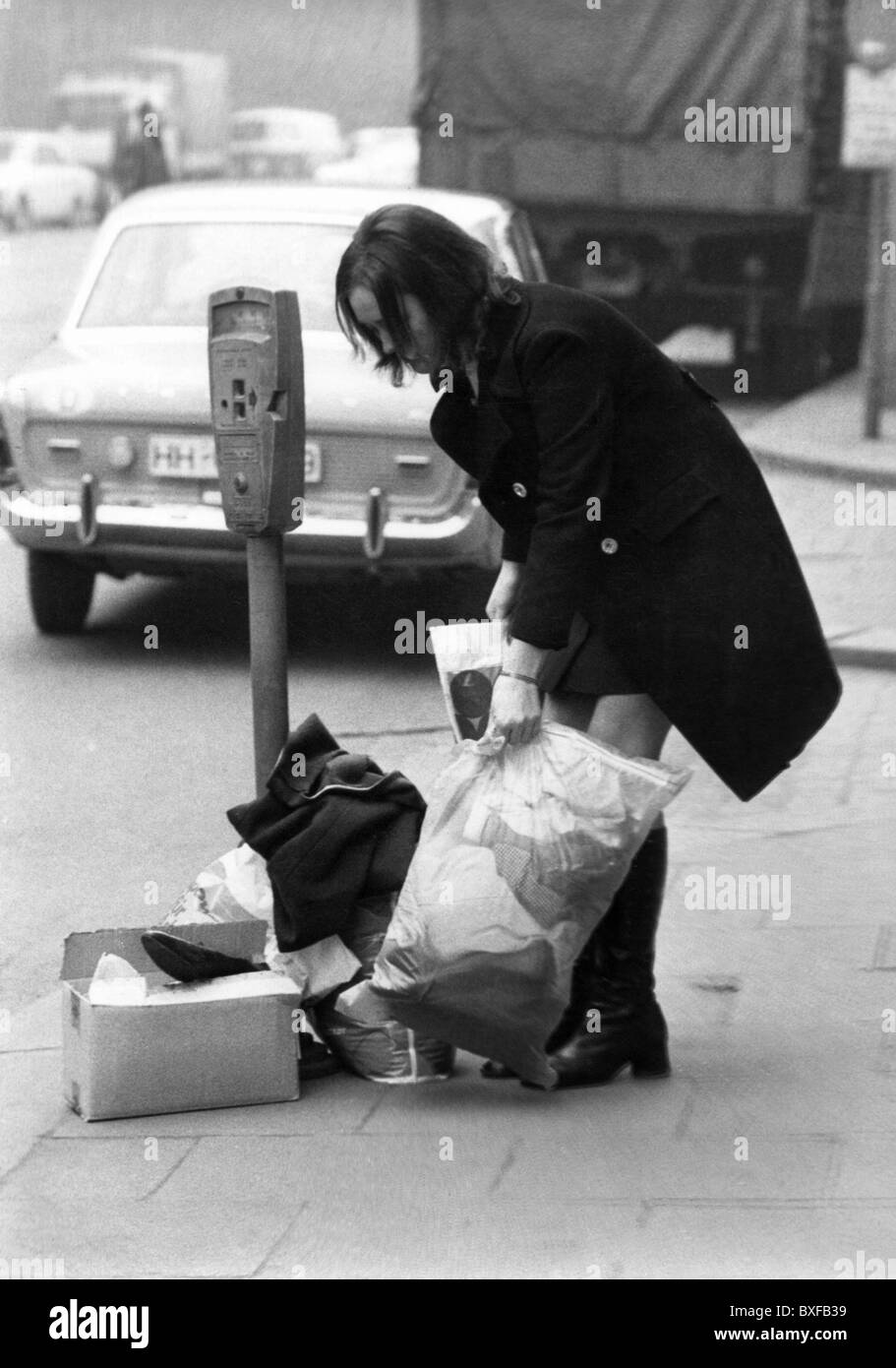 people, women, 1970s, clothing drive for Third World countries, young woman bringing clothes to a collecting point, Hamburg, Germany, 1971, Additional-Rights-Clearences-Not Available Stock Photo