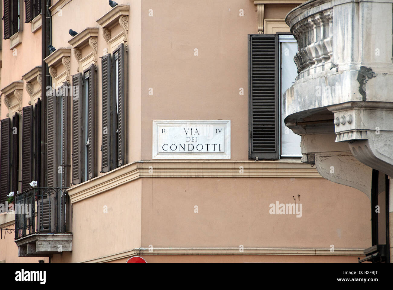 Street sign for Via dei Condotti Stock Photo