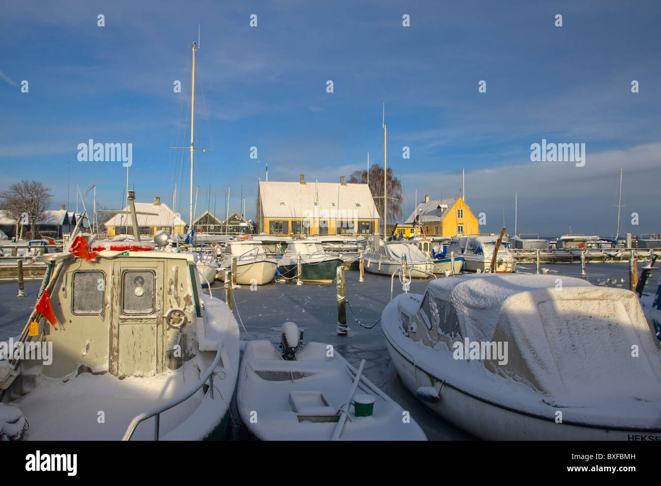 Snow and ice covered Dragor harbour Stock Photo