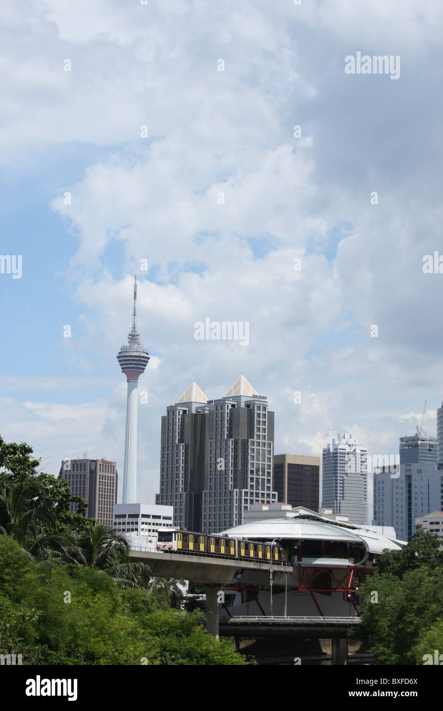 KL Tower and LRT train in Kuala Lumpur, Malaysia Stock Photo