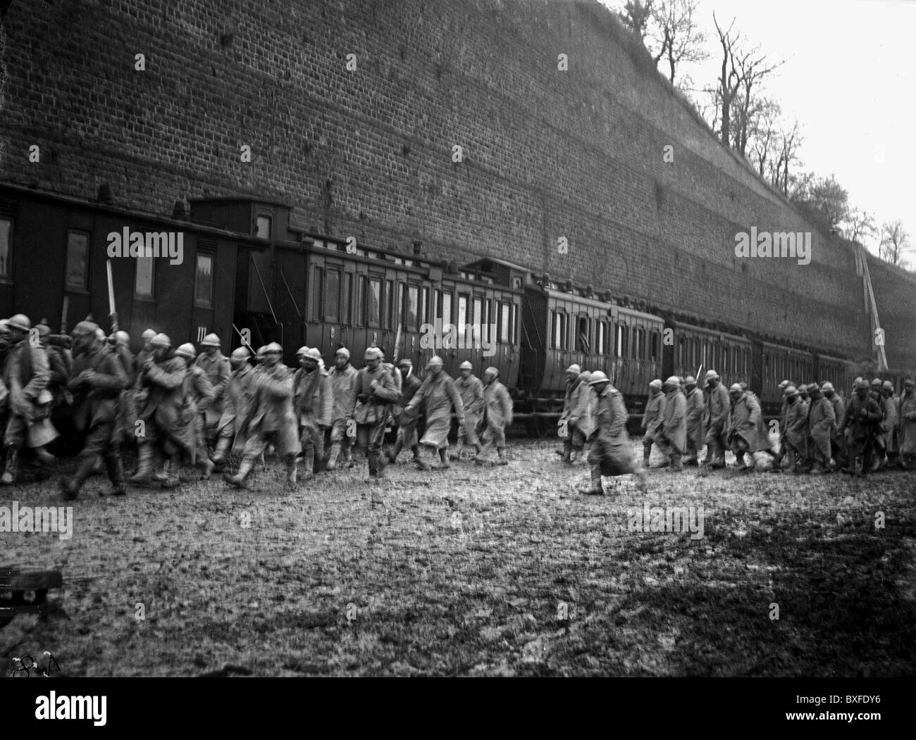events, First World War / WWI, Western Front 1915 - 1918, German soldiers with French prisoners of war at a railway station, France, circa 1915/1916, 20th century, historic, historical, 1910s, 10s, Germany, military, German Reich, Empire, uniform, uniforms, captivity, POW, POWs, guard, pickelhaube, spiked helmet, rifle, bayonet, train, people, Additional-Rights-Clearences-Not Available Stock Photo