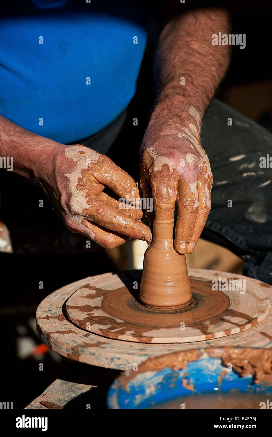 Crafting a pot from clay Stock Photo Alamy