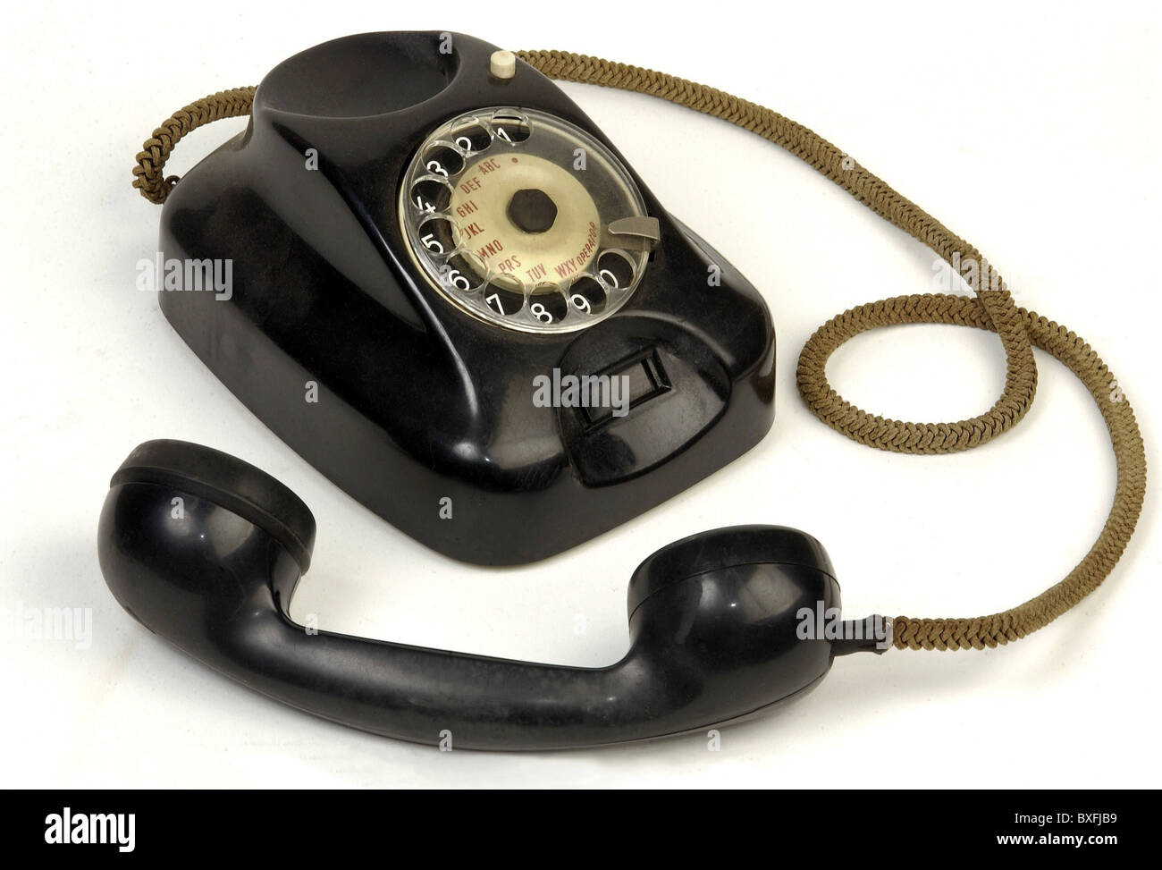 technics, telephone, Siemens telephone, bakelite, Germany, 1950s, 50s, 20th century, historic, historical, extension, direct dialing, direct dialling, device, devices, physical device, desk telephone, desk telephones, telephone receiver, telephone receivers, fixed-line network, landline network, busy, engaged, Made in Germany, clipping, cut out, cut-out, cut-outs, Additional-Rights-Clearences-Not Available Stock Photo