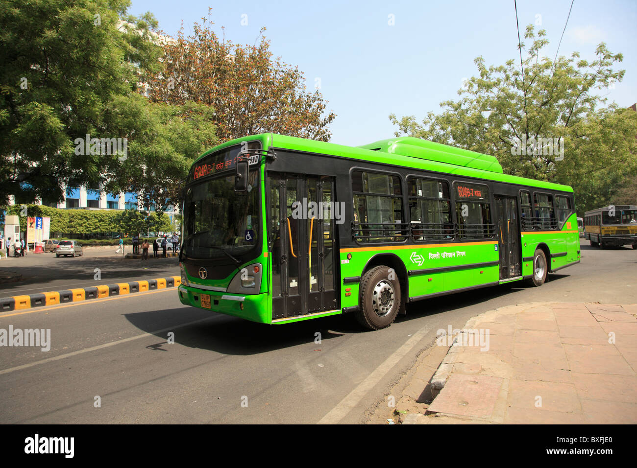 New environmentally friendly public buses in New Delhi India. The low-floor buses run on compressed natural gas (CNG). Stock Photo