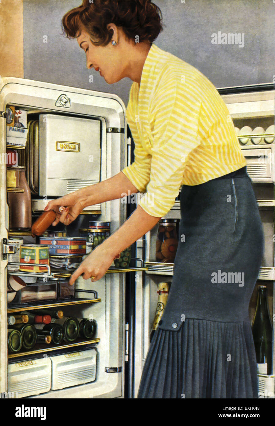 household, kitchen and kitchenware, refrigerator, housewife open fridge, Germany, 1956, Additional-Rights-Clearences-Not Available Stock Photo
