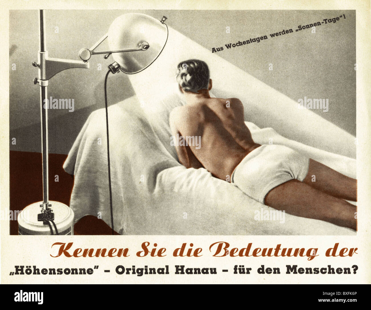 bathing, sunbathing, man lying under tanning lamp by Hanau, made by Quarzlampen GmbH Hanau, Germany, 1937, Additional-Rights-Clearences-Not Available Stock Photo