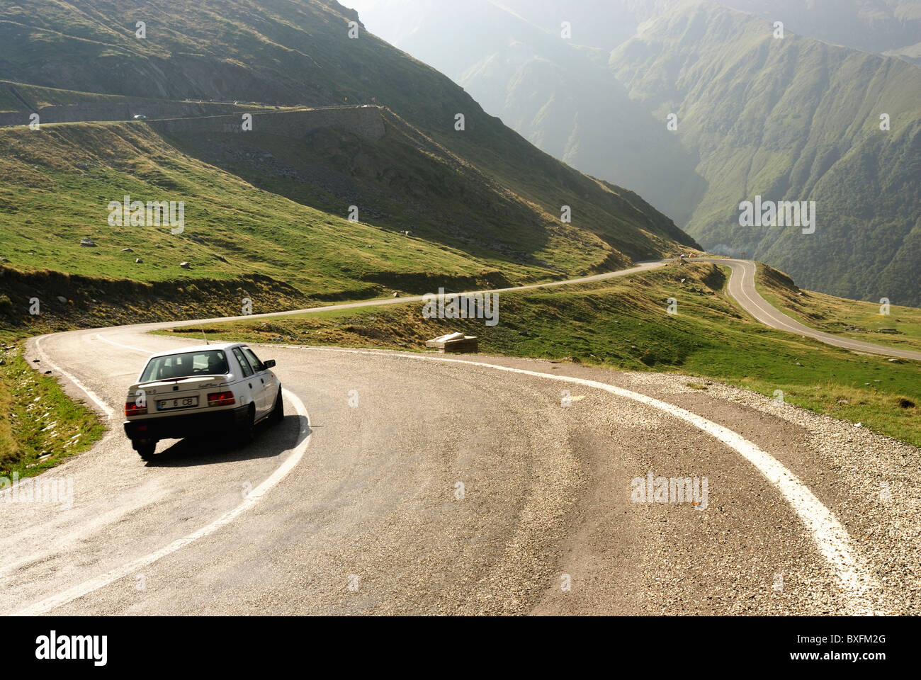Car driving along the Transfagarasan road, Fagaras Mountains, Romania Stock Photo