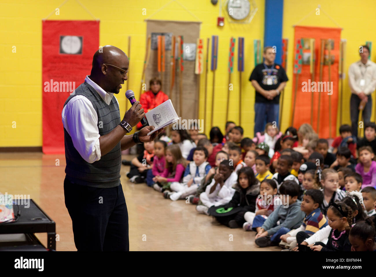 Elementary 3rd grade students listen to children's author Derrick