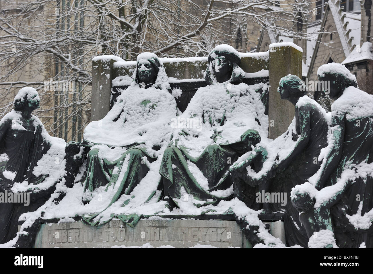 Monument in honour of the Van Eyck brothers in winter in the snow, Ghent, Belgium Stock Photo