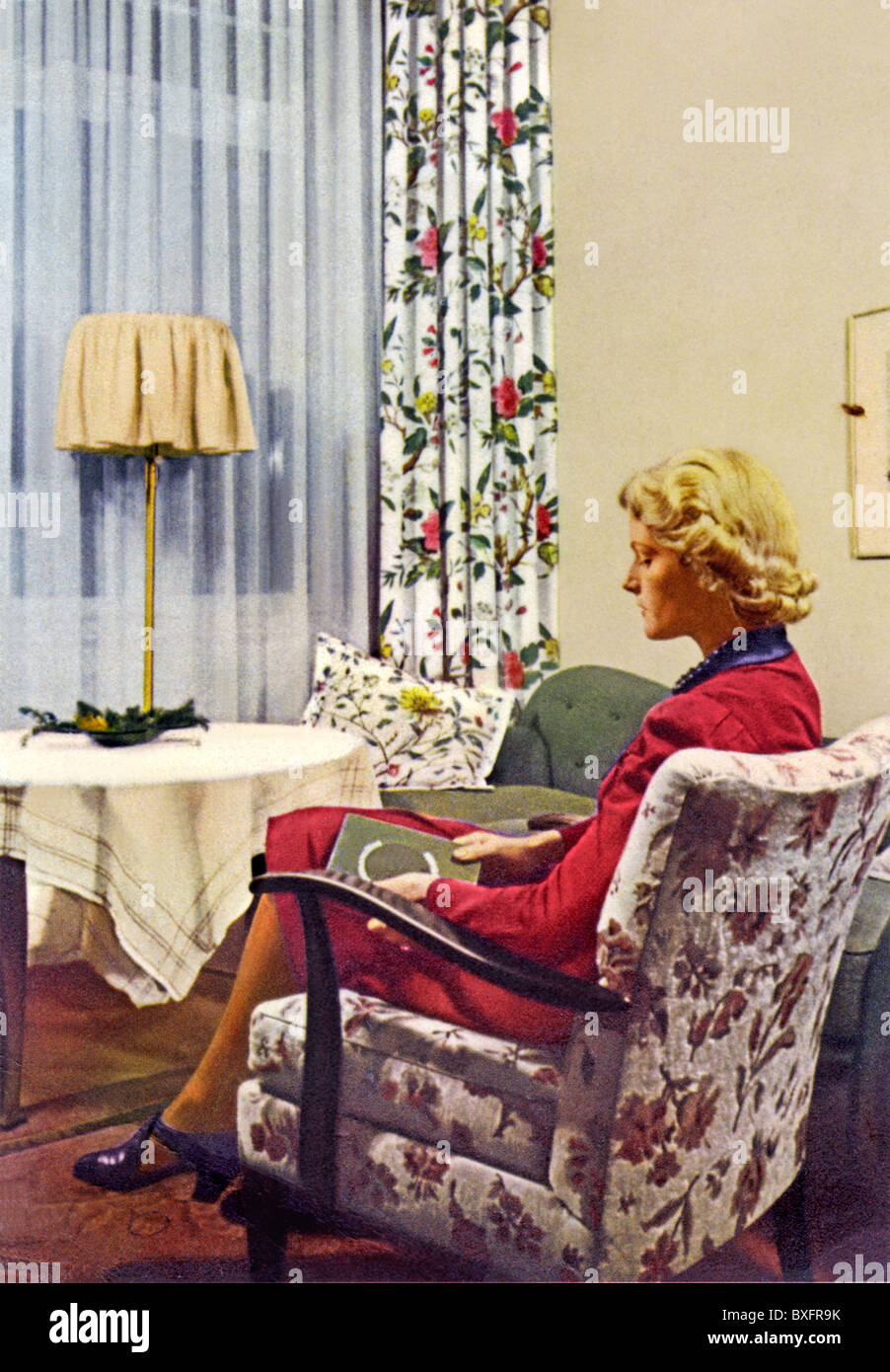furnishings, woman sitting in living-room, advertising for Indanthren, Germany, circa 1942, Additional-Rights-Clearences-Not Available Stock Photo