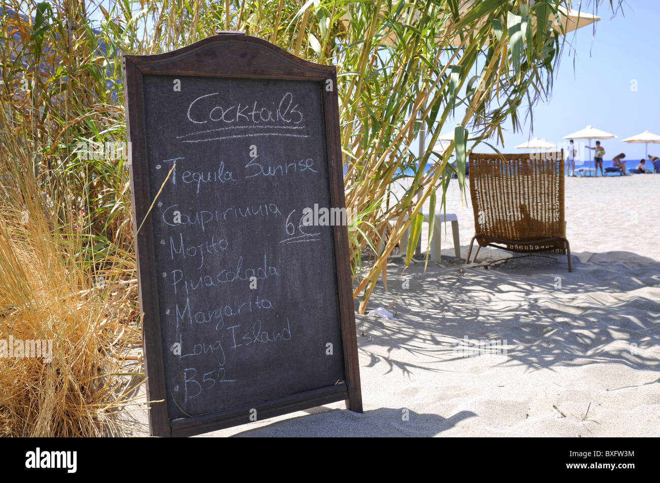 Cafe menu board with cocktails in Plakias beach, Crete Stock Photo
