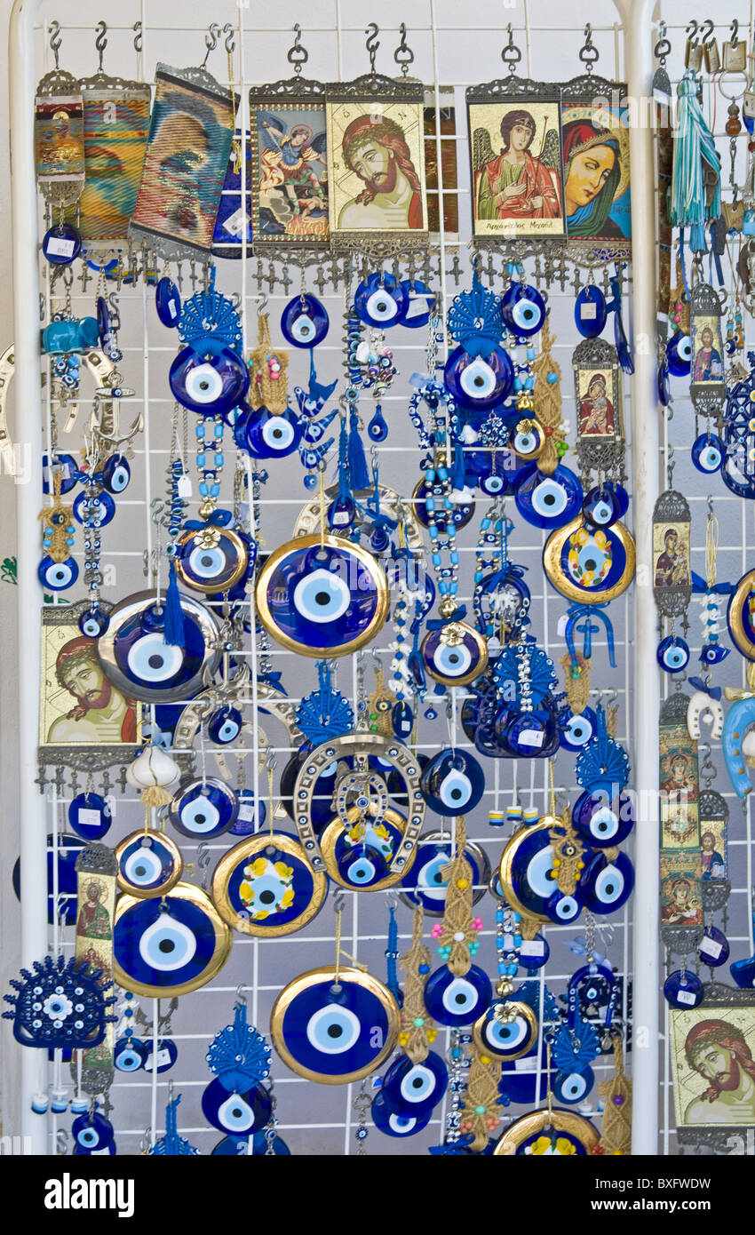 Greek souvenirs - small orthodox icons and blue round eyes in Crete ...