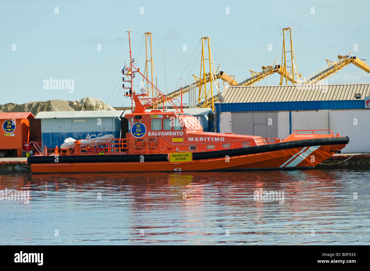 A Spanish Life Boat, in Garrucha harbour, moored and waiting for its next call out. Stock Photo