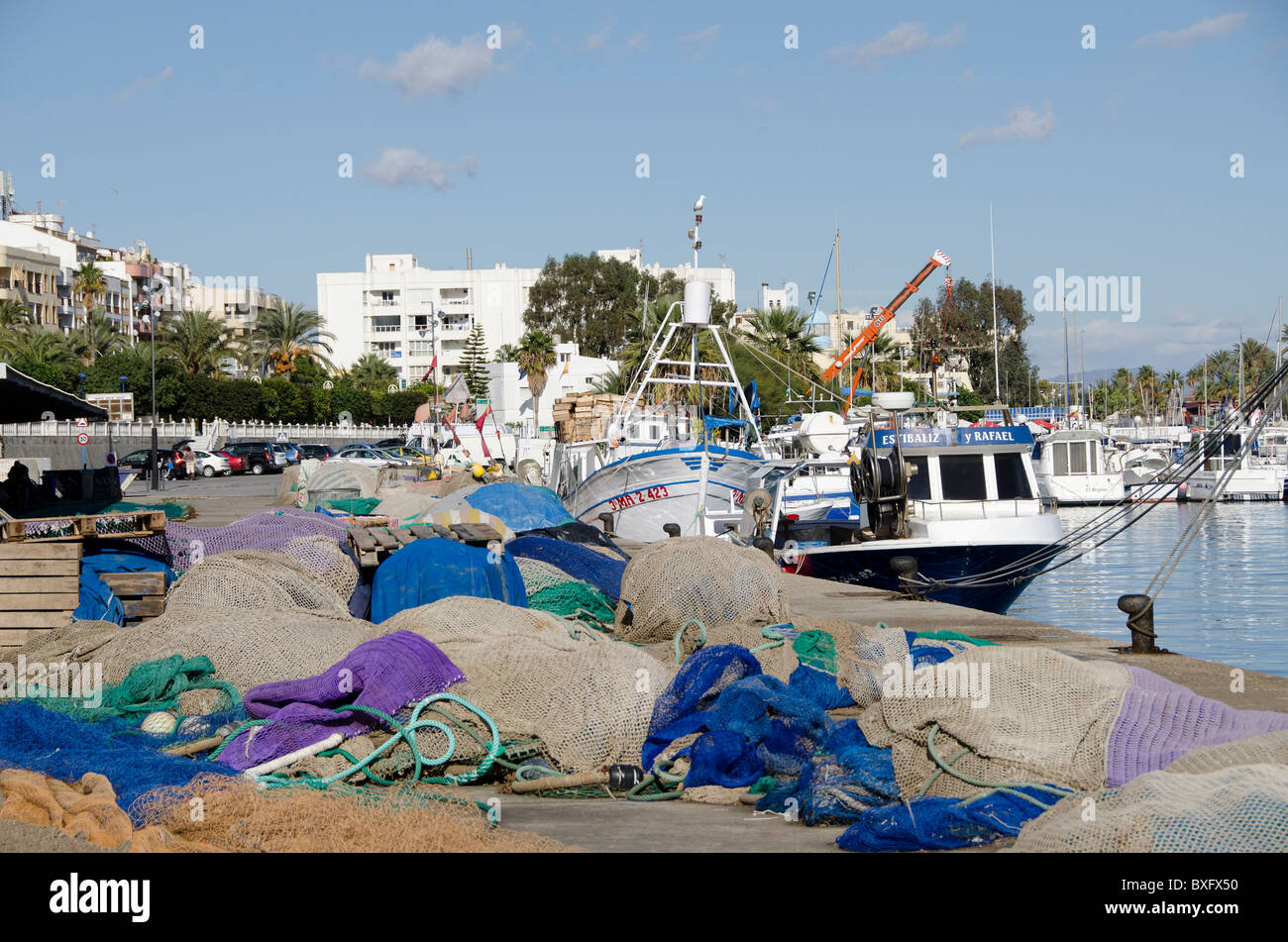 Fishing Boats in Garrucha harbour, Spain on a Sunday lunchtime. Stock Photo